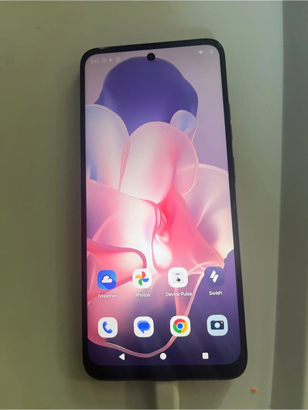 Motorola Black Smartphone with Pink & Purple Screen Accent